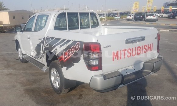 Buy Import Mitsubishi L200 White Car in Import - Dubai in Al Jazirah State Buy Import Mitsubishi L200 White Car in Import - Dubai in Al Jazirah State
