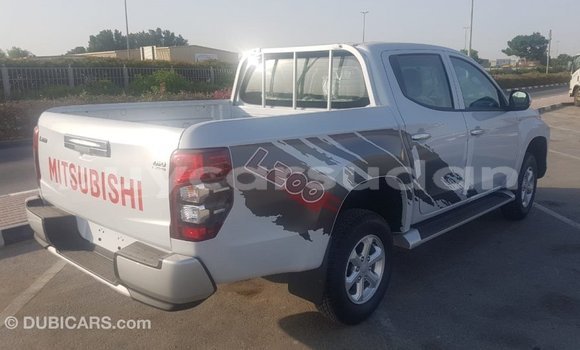 Buy Import Mitsubishi L200 White Car in Import - Dubai in Al Jazirah State Buy Import Mitsubishi L200 White Car in Import - Dubai in Al Jazirah State