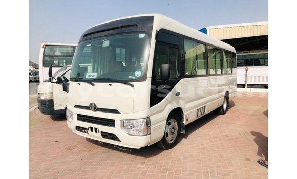 Buy Import Toyota Coaster White Car in Import - Dubai in Al Jazirah State