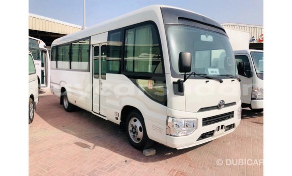 Acheter Import Voiture Toyota Coaster Blanc à Import - Dubai, État d'Al Jazirah Acheter Import Voiture Toyota Coaster Blanc à Import - Dubai, État d'Al Jazirah