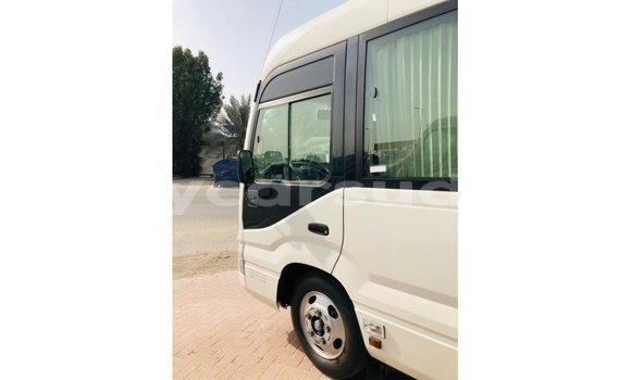 Acheter Import Voiture Toyota Coaster Blanc à Import - Dubai, État d'Al Jazirah Acheter Import Voiture Toyota Coaster Blanc à Import - Dubai, État d'Al Jazirah