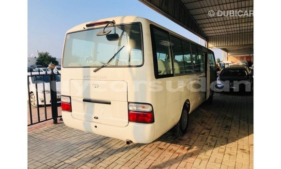 Acheter Import Voiture Toyota Coaster Blanc à Import - Dubai, État d'Al Jazirah Acheter Import Voiture Toyota Coaster Blanc à Import - Dubai, État d'Al Jazirah