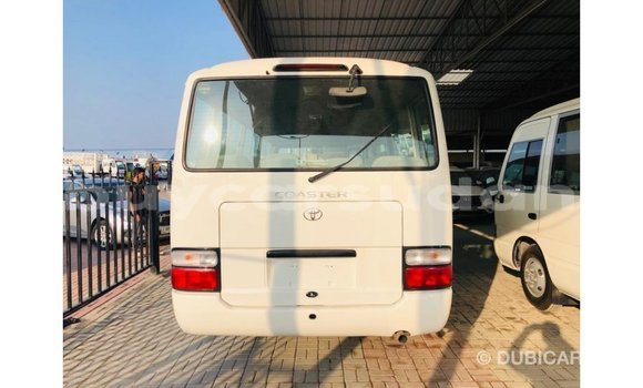 Acheter Import Voiture Toyota Coaster Blanc à Import - Dubai, État d'Al Jazirah Acheter Import Voiture Toyota Coaster Blanc à Import - Dubai, État d'Al Jazirah