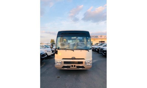 Buy Import Toyota Coaster White Car in Import - Dubai in Al Jazirah State