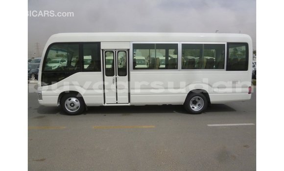 Buy Import Toyota Coaster White Car in Import - Dubai in Al Jazirah State Buy Import Toyota Coaster White Car in Import - Dubai in Al Jazirah State