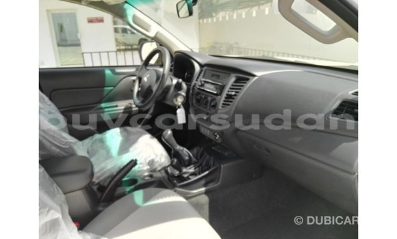 Buy Import Mitsubishi L200 White Car in Import - Dubai in Al Jazirah State Buy Import Mitsubishi L200 White Car in Import - Dubai in Al Jazirah State