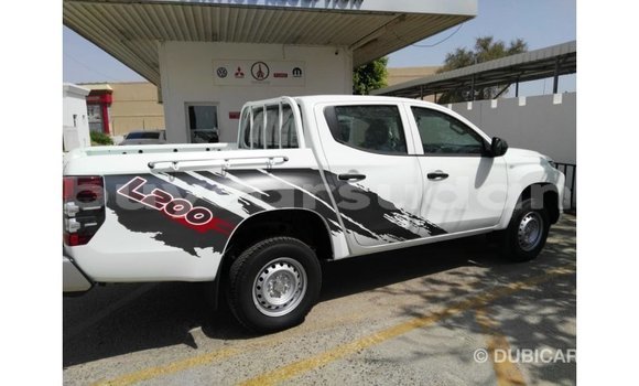 Buy Import Mitsubishi L200 White Car in Import - Dubai in Al Jazirah State Buy Import Mitsubishi L200 White Car in Import - Dubai in Al Jazirah State